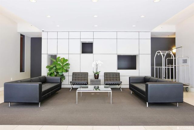 a view of a dinning tables and chairs in a patio