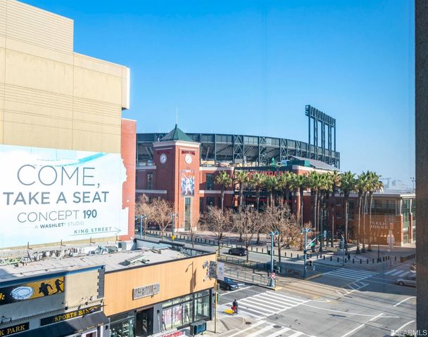 a workspace with furniture and a potted plant