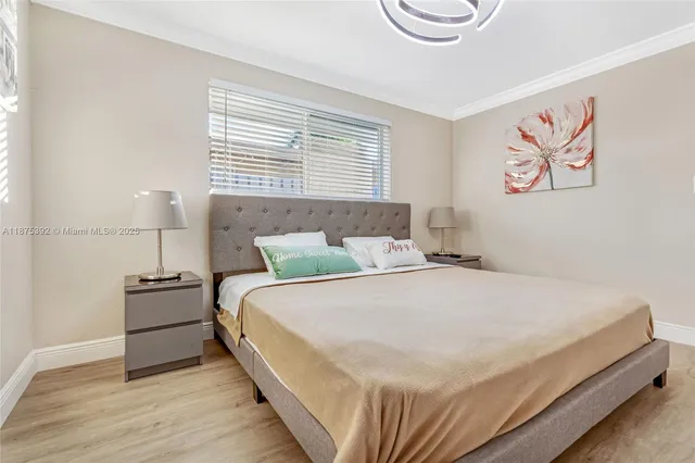 a bathroom with a sink vanity and a mirror