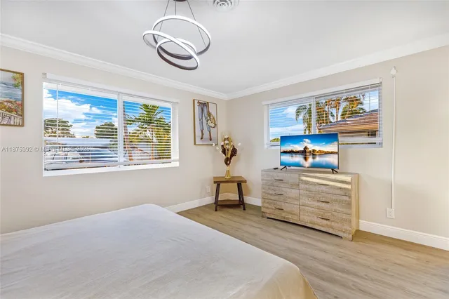 a bathroom with a toilet a sink and a mirror