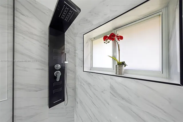 a utility room with a sink dryer and washer