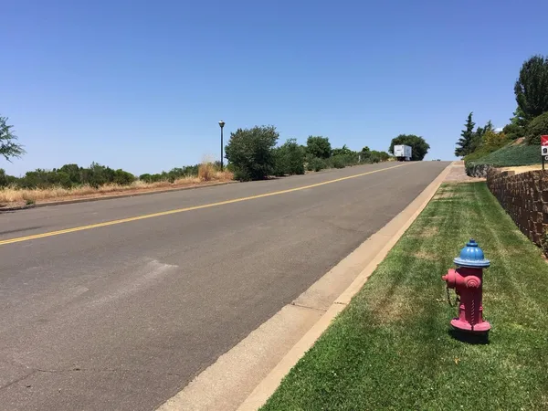 a view of a terrace with a yard