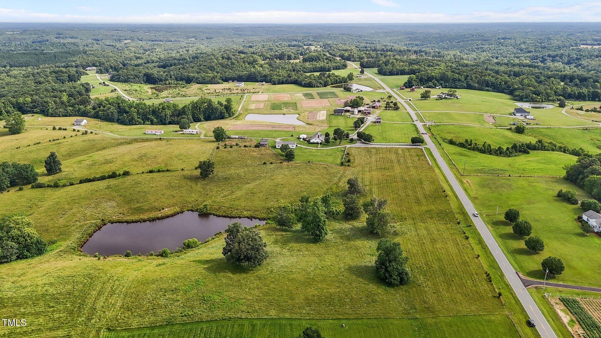 0 Corbett Ridge Road Mebane, NC 27302 - Photo 12 of 20 an aerial view of residential houses with outdoor space