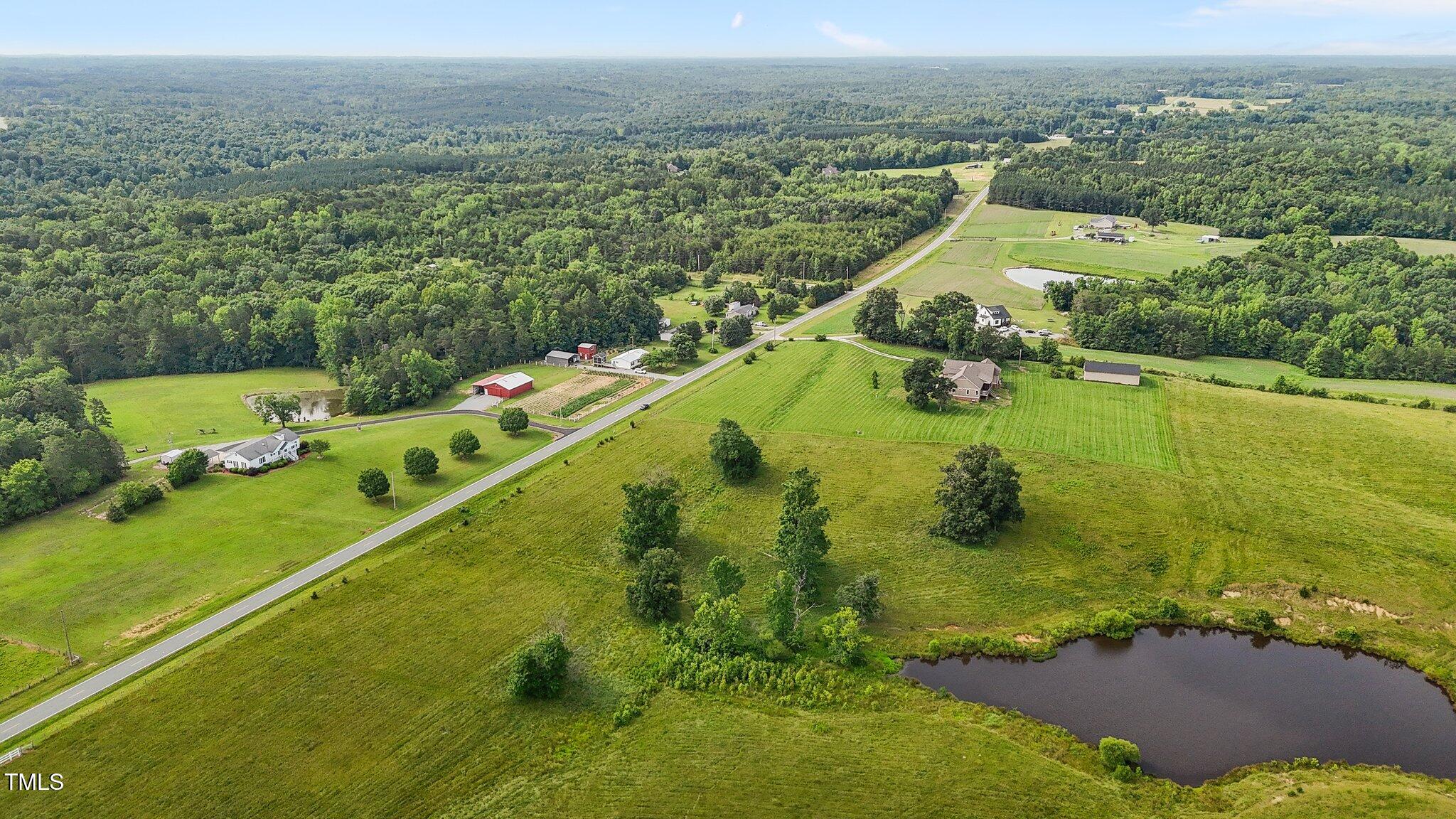0 Corbett Ridge Road Mebane, NC 27302 - Photo 6 of 20 an aerial view of a houses with a yard