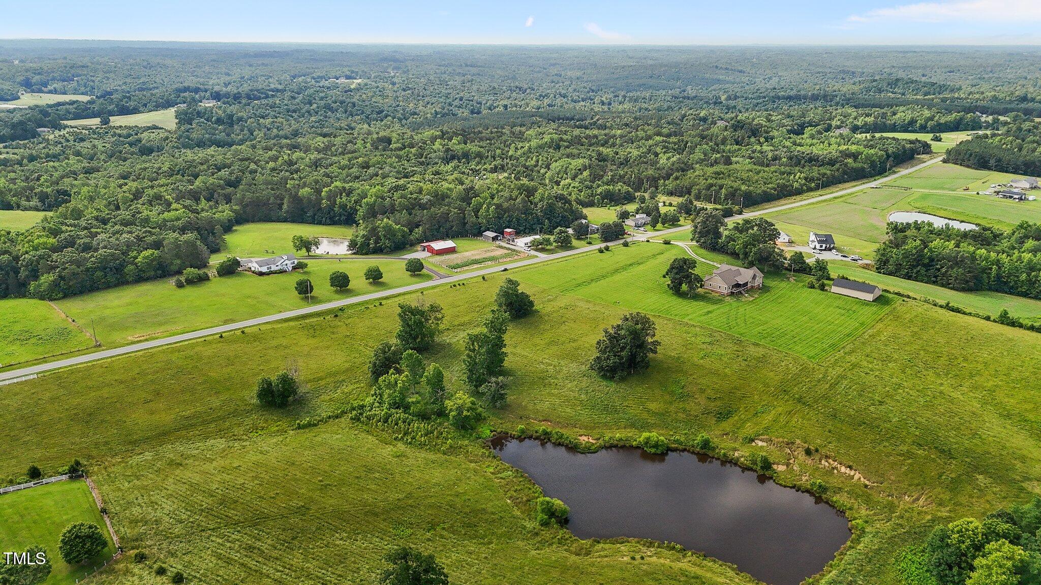 0 Corbett Ridge Road Mebane, NC 27302 - Photo 7 of 20 an aerial view of a house with a yard