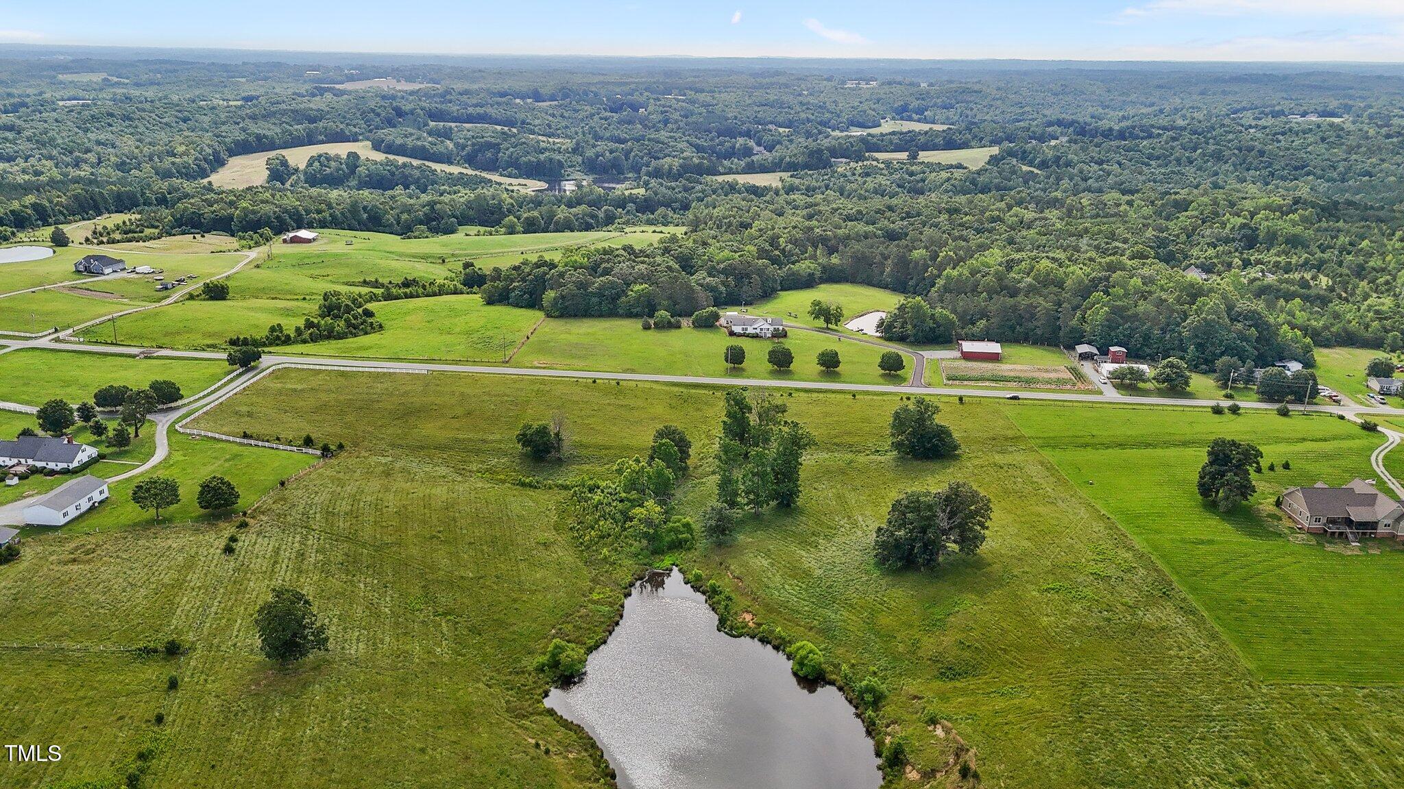 0 Corbett Ridge Road Mebane, NC 27302 - Photo 8 of 20 an aerial view of a house with a yard