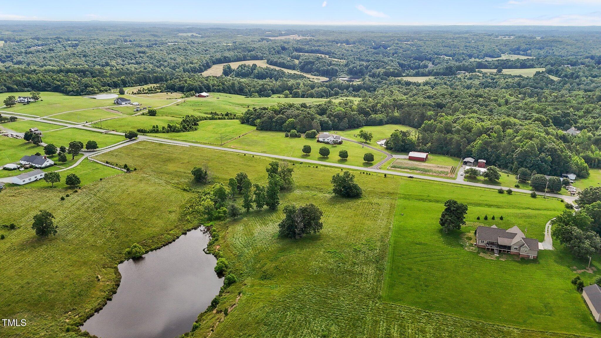 0 Corbett Ridge Road Mebane, NC 27302 - Photo 9 of 20 an aerial view of a house with a yard
