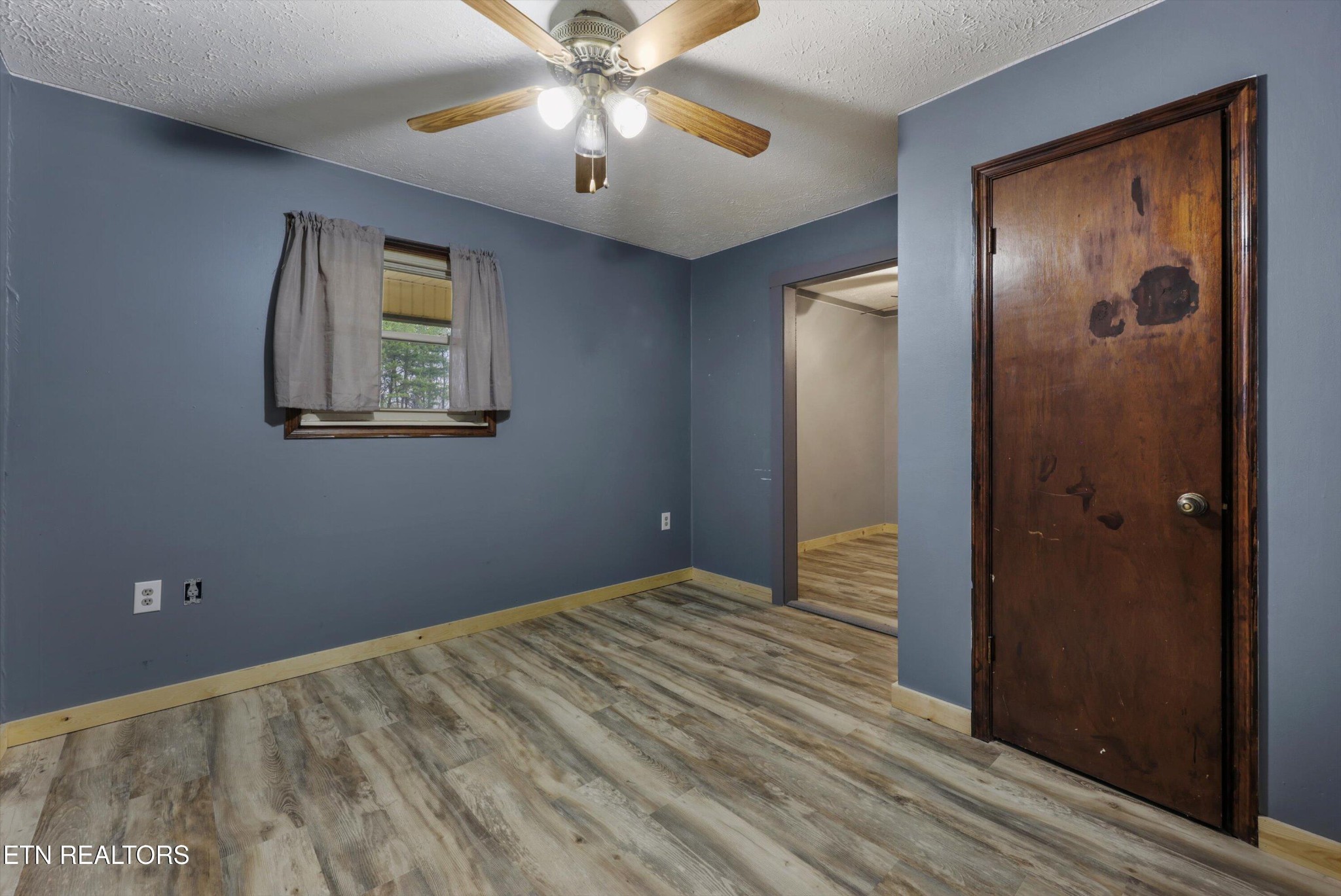 47 Paint Rock Ferry Road Kingston, TN 37763 - Photo 19 of 38 a view of empty room with wooden floor