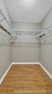 a view of a room with racks on the wall
