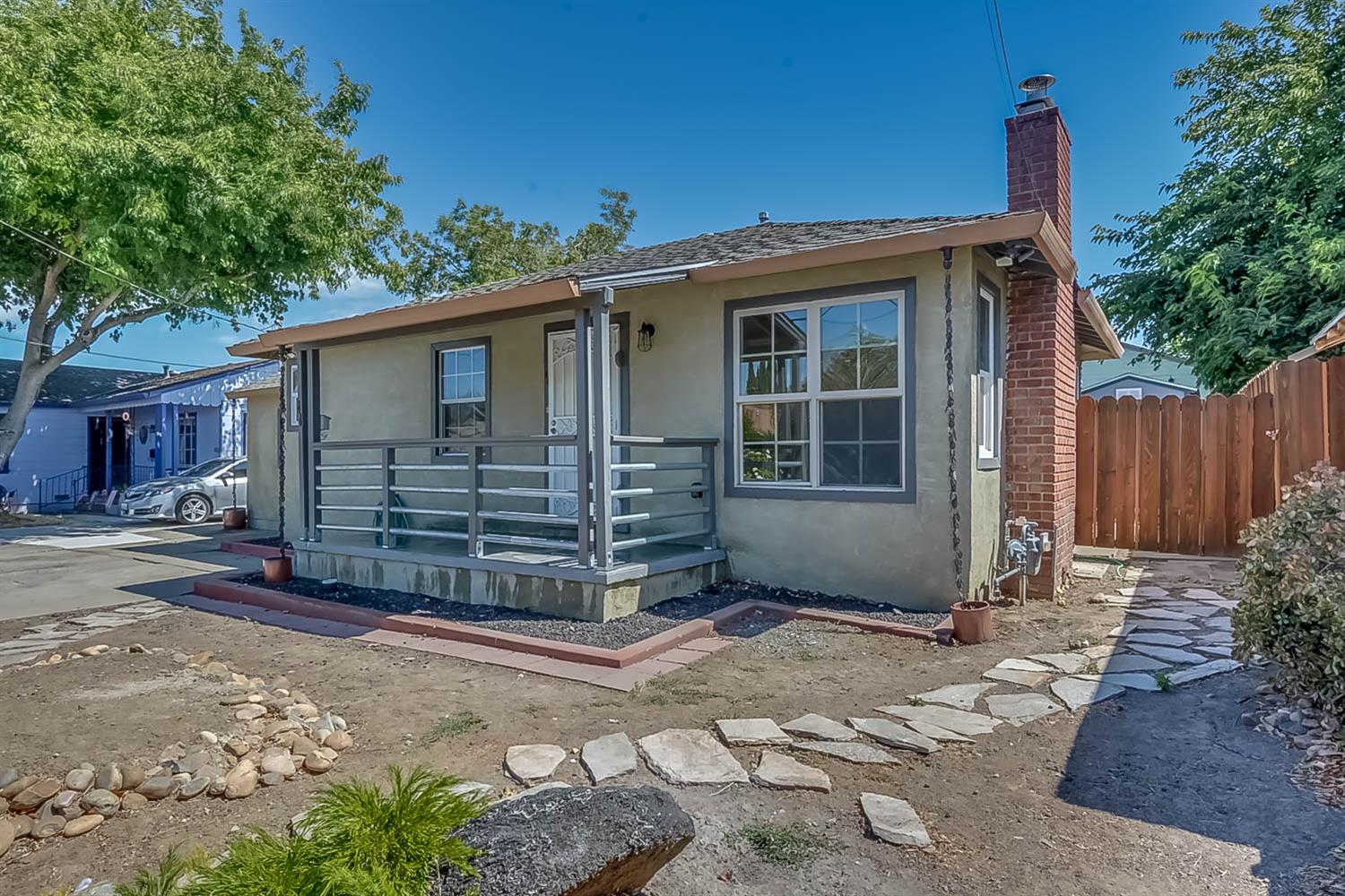 44 Montecello Street Bay Point, CA 94565 - Photo 1 of 1 a view of a house with a small yard and a large tree