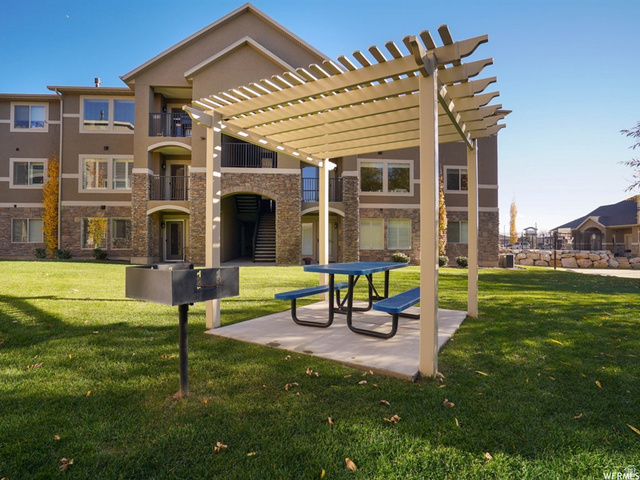 905 South Main Street, Unit G Layton, UT 84041 - Photo 36 of 36 View of home's community with a yard, a pergola, and a patio area