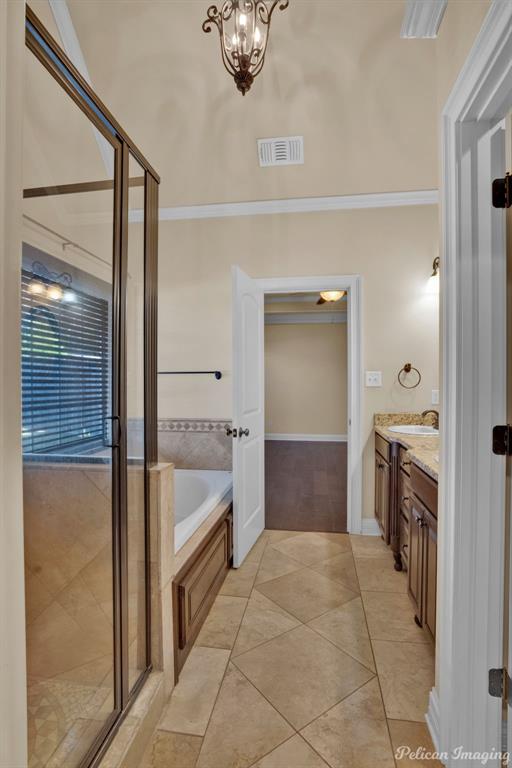 2805 Clearbrook Way Haughton, LA 71037 - Photo 21 of 36 a bathroom with a tub shower and sink