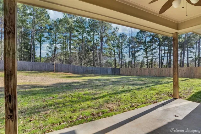 a view of swimming pool from a window