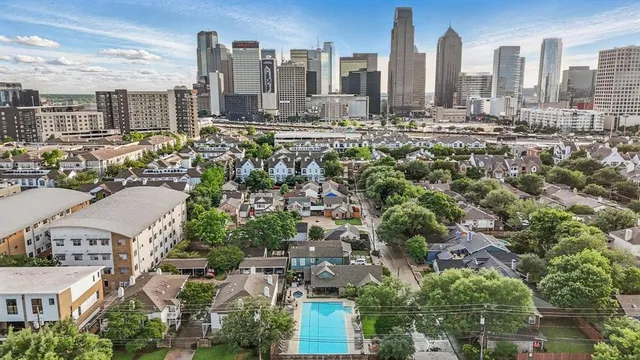 a view of a building with a yard