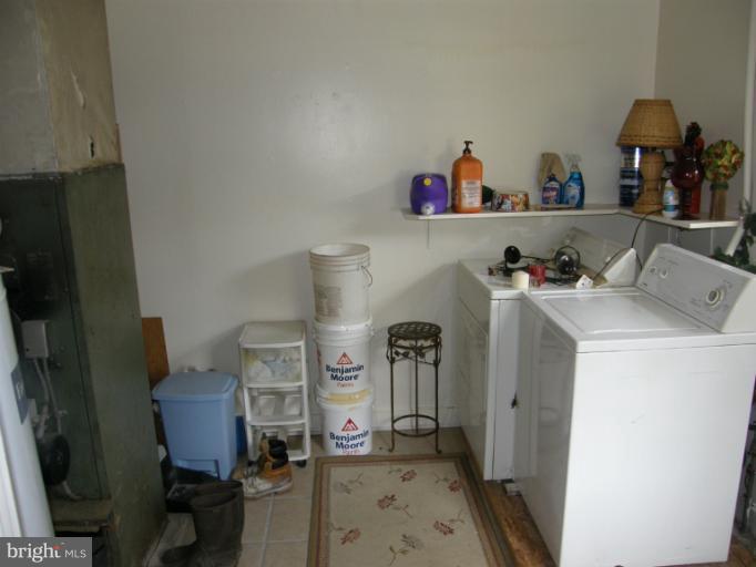 6885 Harmony Road Preston, MD 21655 - Photo 12 of 22 a room with storage and utility
