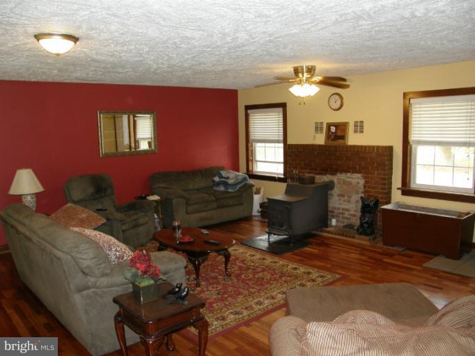 6885 Harmony Road Preston, MD 21655 - Photo 16 of 22 a living room with furniture window and wooden floor