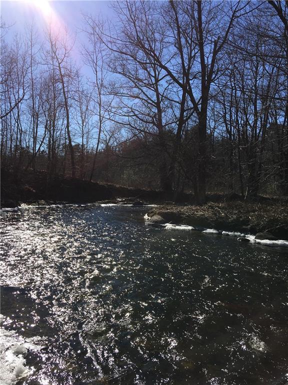 50 Old County Road Thomaston, ME 04861 - Photo 7 of 7 Mill River borders the back of the...