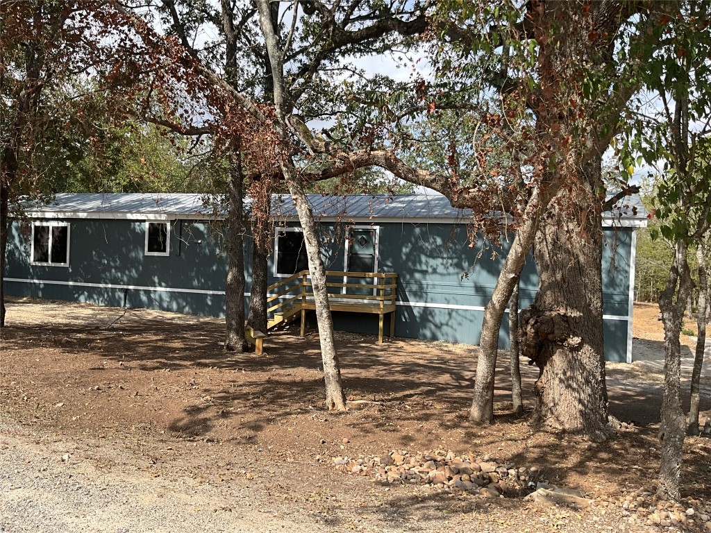 204 Overhill Road Bastrop, TX 78602 - Photo 18 of 18 a front view of a house with a tree