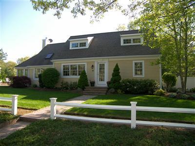 29 Alma Road Mashpee, MA 02649 - Photo 1 of 28 a front view of a house with a yard