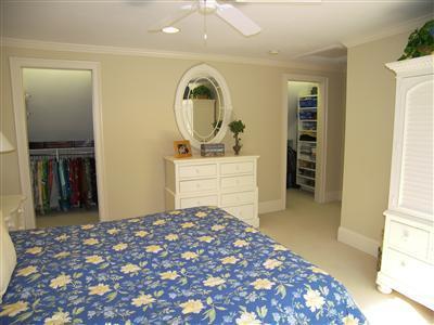 29 Alma Road Mashpee, MA 02649 - Photo 19 of 28 a bedroom with a bed and a dresser