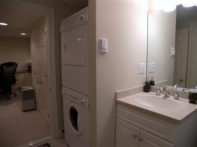 29 Alma Road Mashpee, MA 02649 - Photo 23 of 28 a bathroom with a sink vanity and mirror