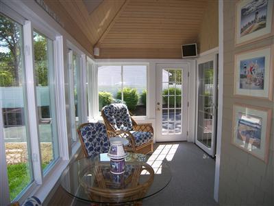 29 Alma Road Mashpee, MA 02649 - Photo 6 of 28 a view of a dining room with furniture window and wooden floor