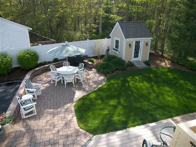 29 Alma Road Mashpee, MA 02649 - Photo 9 of 28 a view of backyard with outdoor seating and green space