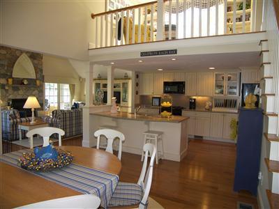 29 Alma Road Mashpee, MA 02649 - Photo 10 of 28 a large kitchen with stainless steel appliances granite countertop a stove and a dining table view