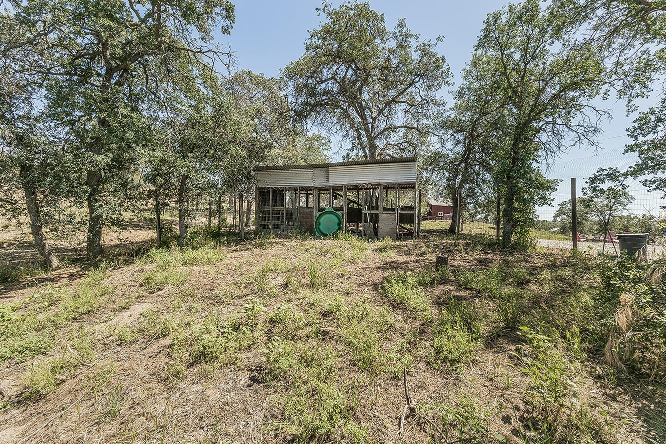 14815 Garlock Lane Prather, CA 93651 - Photo 44 of 80 a view of a house with a yard and sitting area