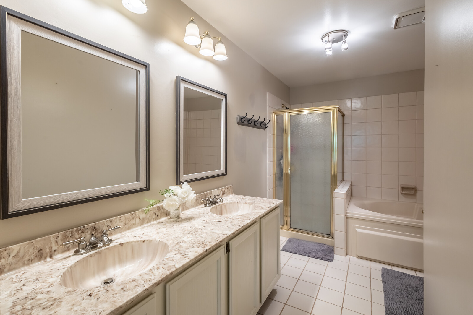 36102 North Springbrook Lane Gurnee, IL 60031 - Photo 16 of 21 a bathroom with a granite countertop sink mirror and a