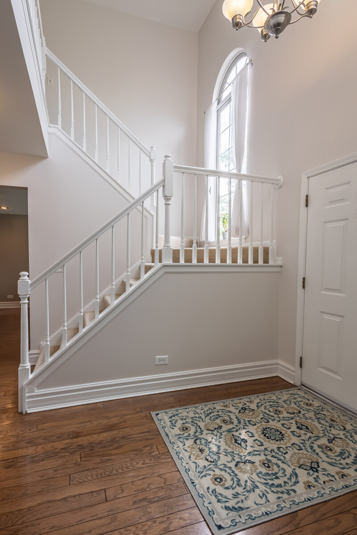 36102 North Springbrook Lane Gurnee, IL 60031 - Photo 2 of 21 a view of entryway and hall with wooden floor