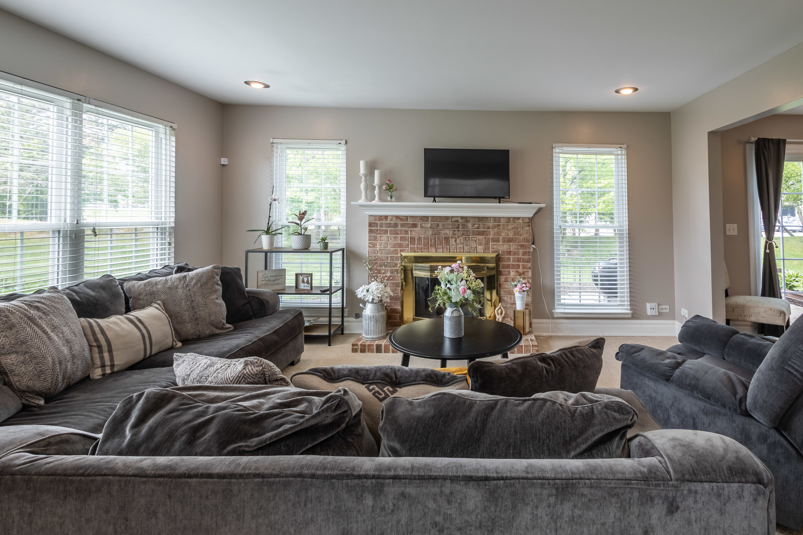 36102 North Springbrook Lane Gurnee, IL 60031 - Photo 3 of 21 a living room with furniture and a fireplace