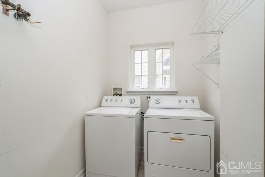 111 San Marco Road Monroe Township, NJ 08831 - Photo 18 of 31 a utility room with dryer and washer