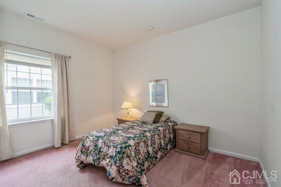 111 San Marco Road Monroe Township, NJ 08831 - Photo 19 of 31 a bedroom with a bed and a window