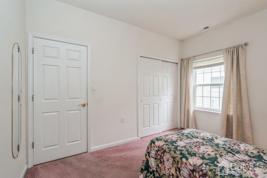 111 San Marco Road Monroe Township, NJ 08831 - Photo 20 of 31 a bedroom with a bed and a window