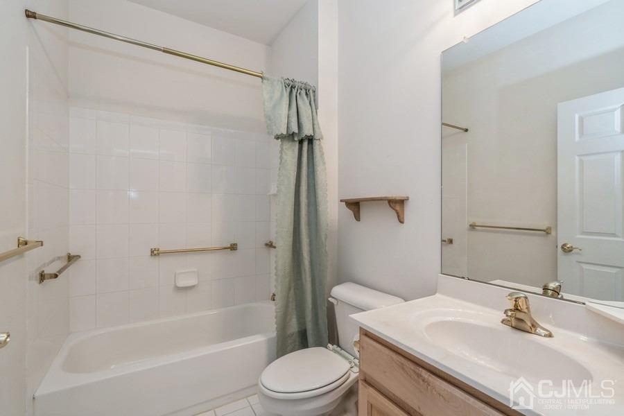 111 San Marco Road Monroe Township, NJ 08831 - Photo 21 of 31 a bathroom with a sink toilet and shower