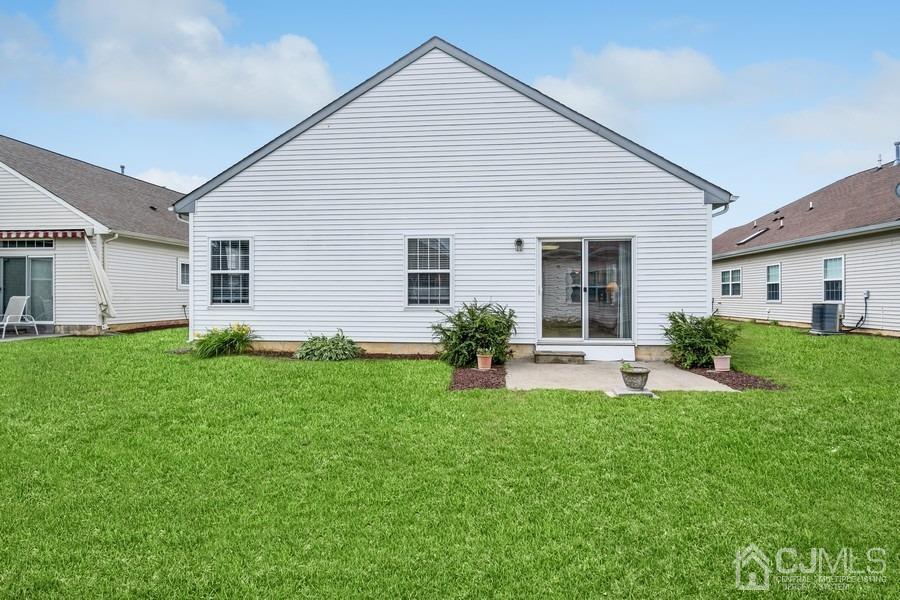 111 San Marco Road Monroe Township, NJ 08831 - Photo 29 of 31 a view of a house with backyard and garden