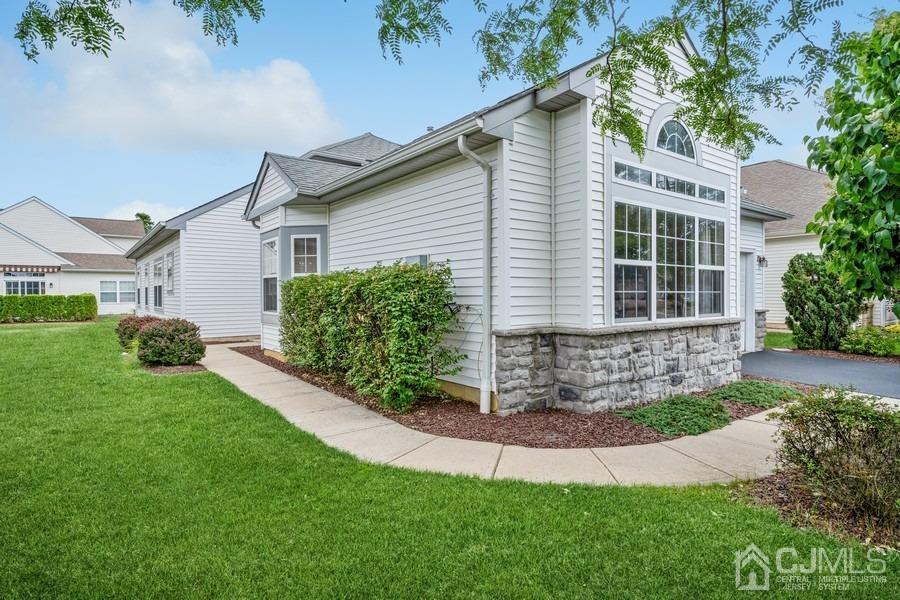 111 San Marco Road Monroe Township, NJ 08831 - Photo 3 of 31 front view of a house with a yard