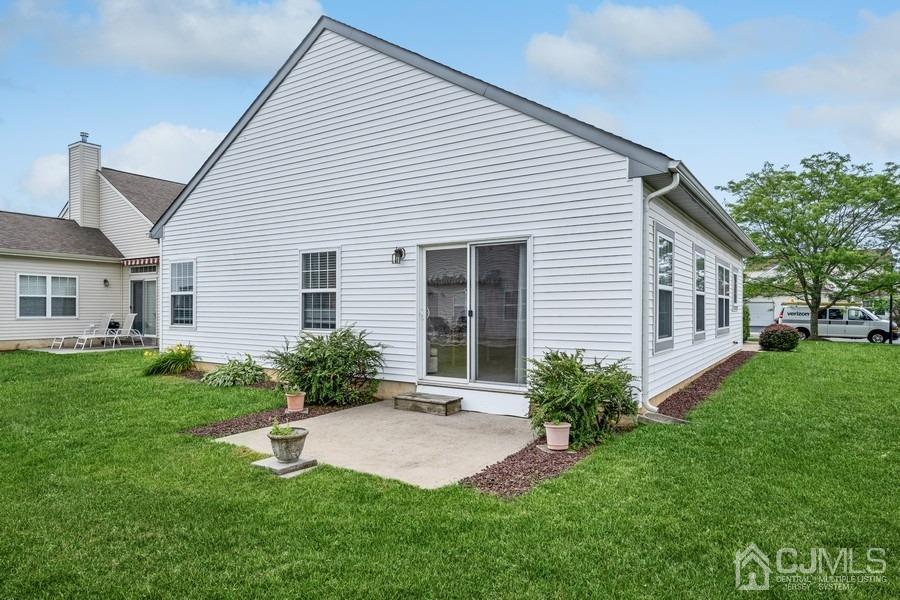111 San Marco Road Monroe Township, NJ 08831 - Photo 31 of 31 a front view of a house with a yard and porch