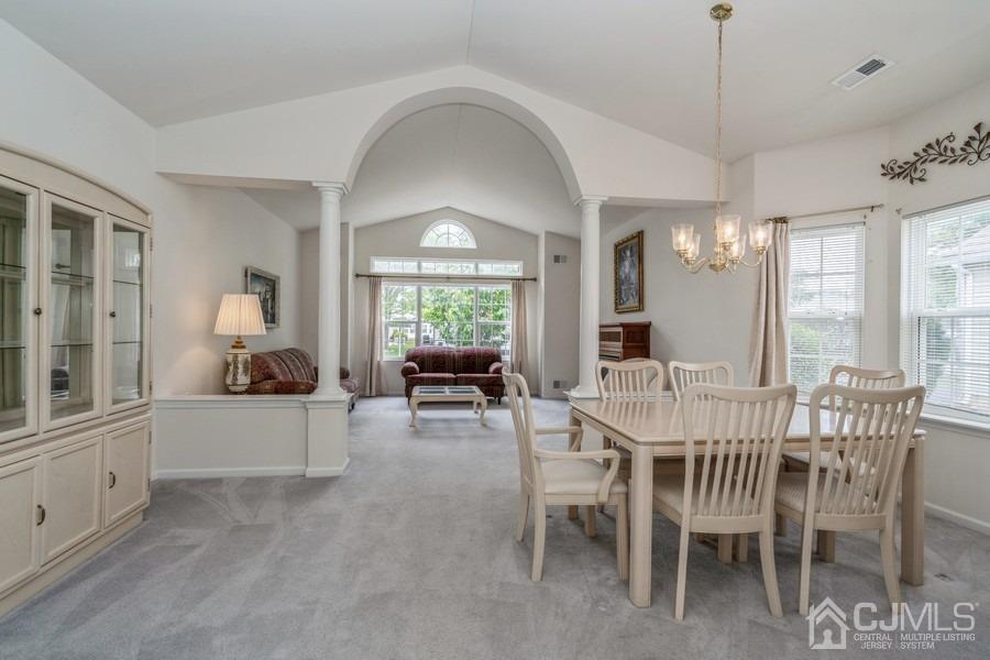 111 San Marco Road Monroe Township, NJ 08831 - Photo 5 of 31 a view of a dining room with furniture and window
