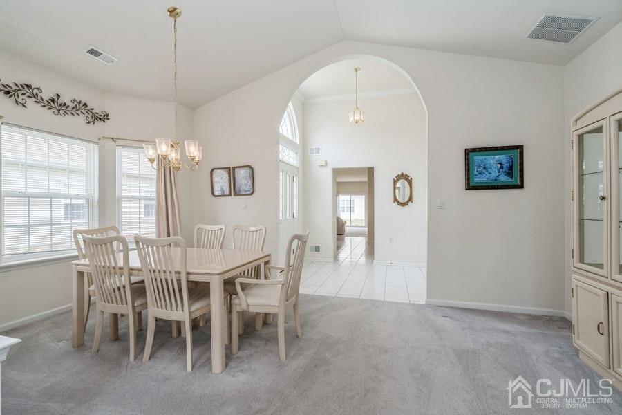 111 San Marco Road Monroe Township, NJ 08831 - Photo 8 of 31 a view of a dining room with furniture