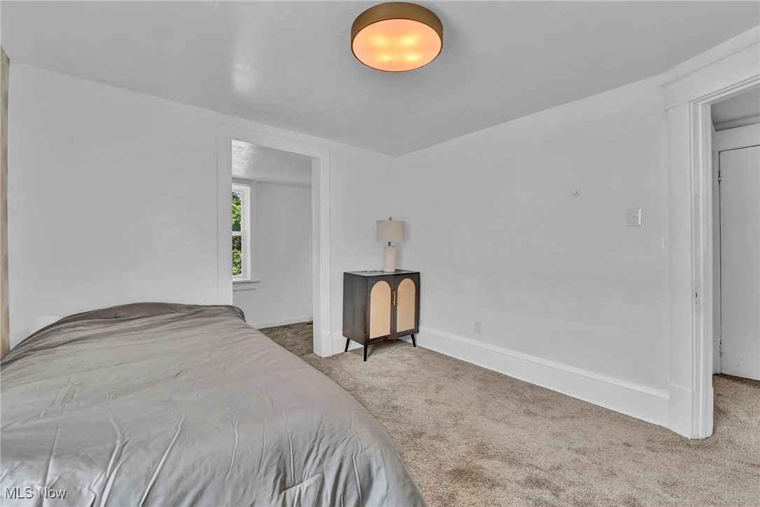 732 Carpenter Street Akron, OH 44310 - Photo 26 of 38 Carpeted bedroom with baseboards with attached bonus room