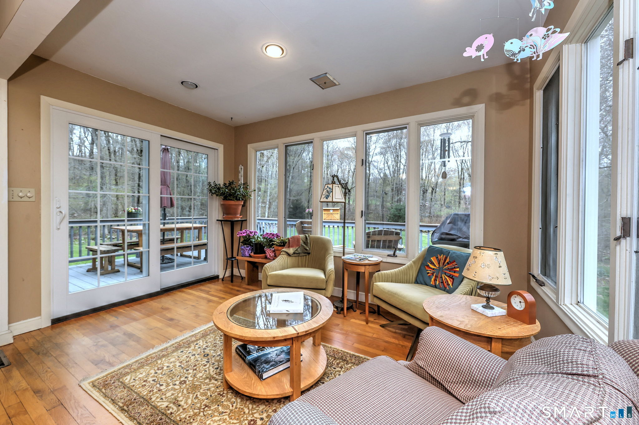 14 Ann Drive Bethany, CT 06524 - Photo 13 of 40 a living room with furniture and a floor to ceiling window