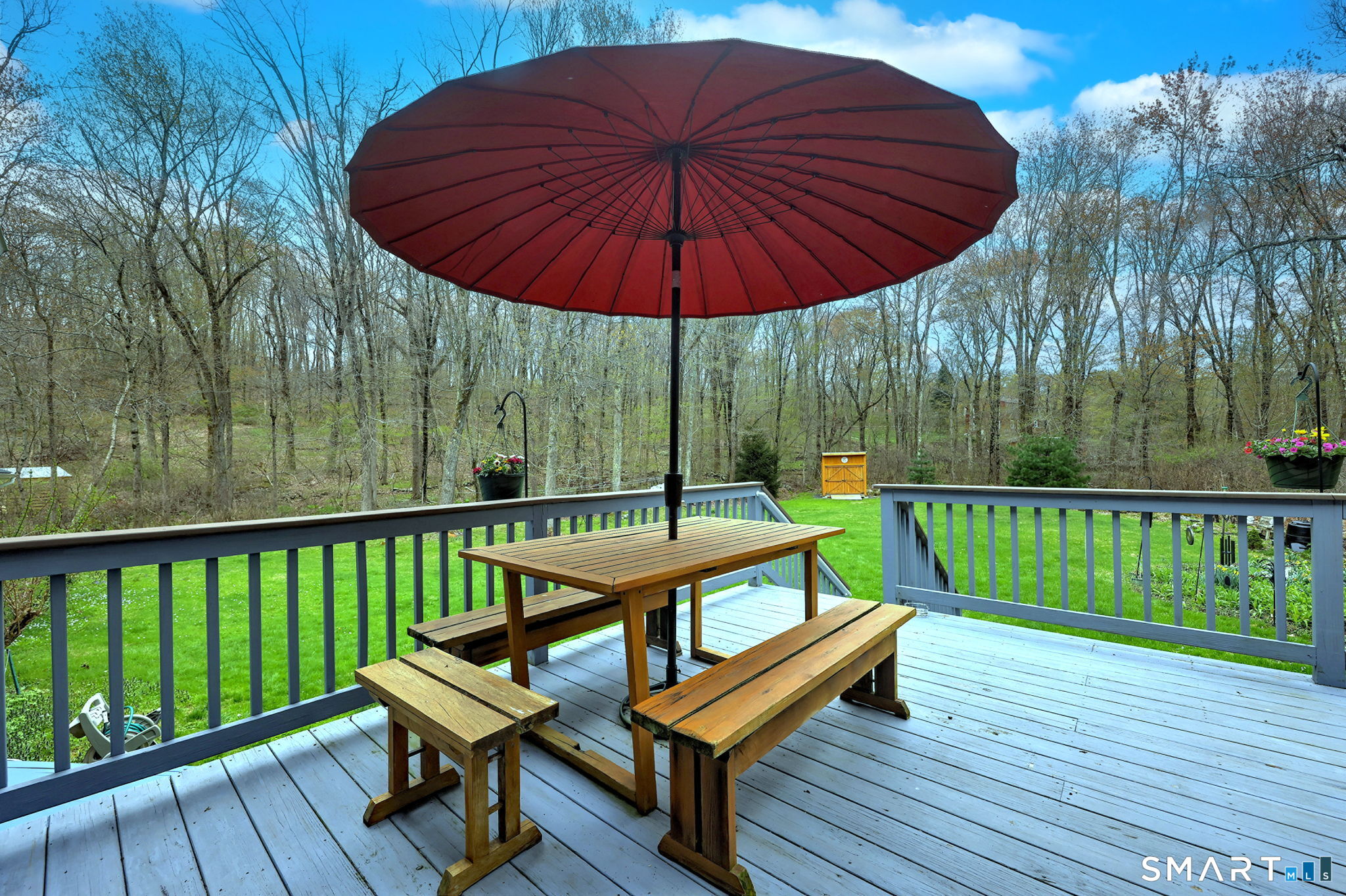 14 Ann Drive Bethany, CT 06524 - Photo 16 of 40 a view of a deck with furniture and a yard