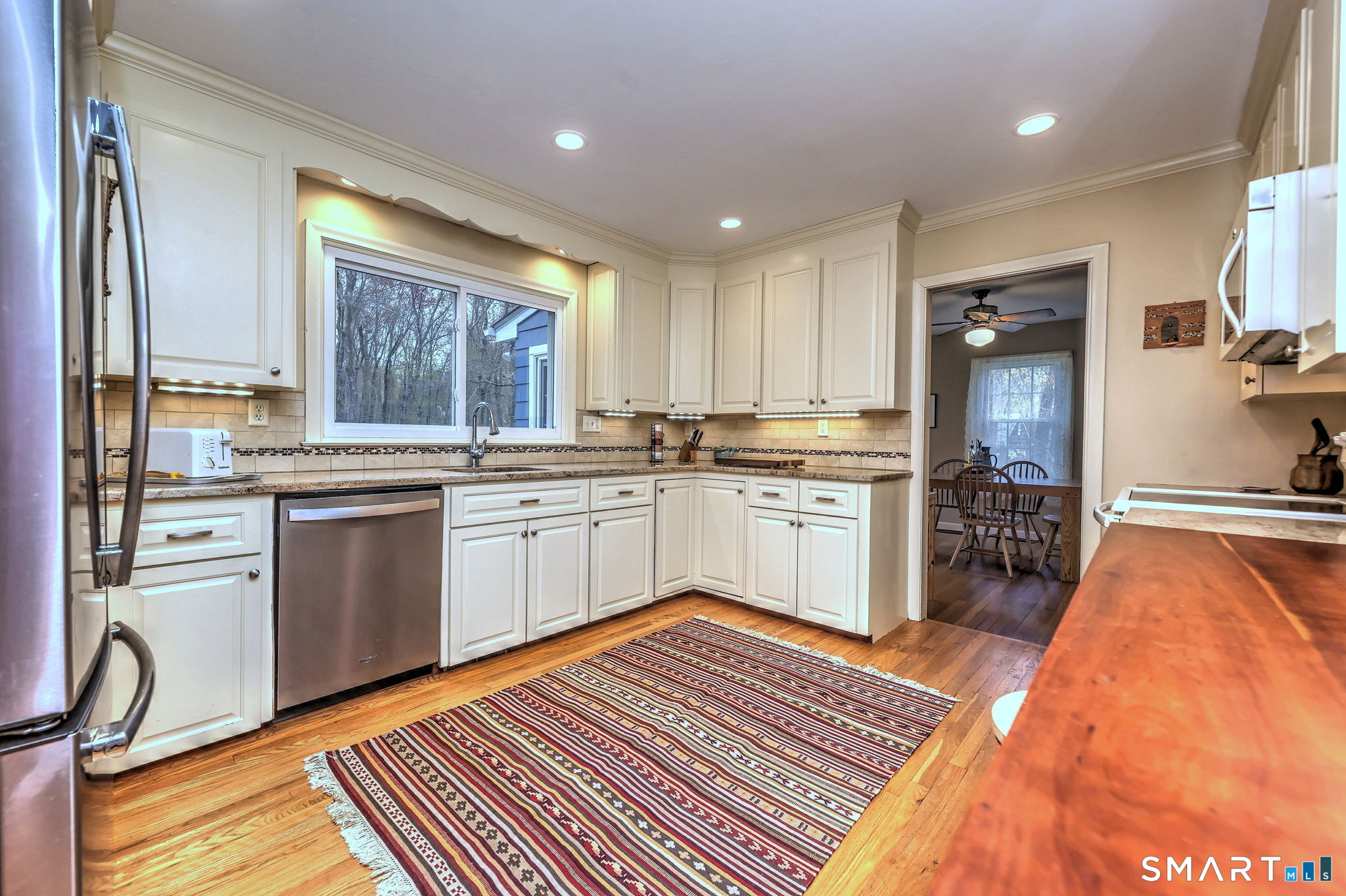 14 Ann Drive Bethany, CT 06524 - Photo 20 of 40 a kitchen with a stove sink and a refrigerator