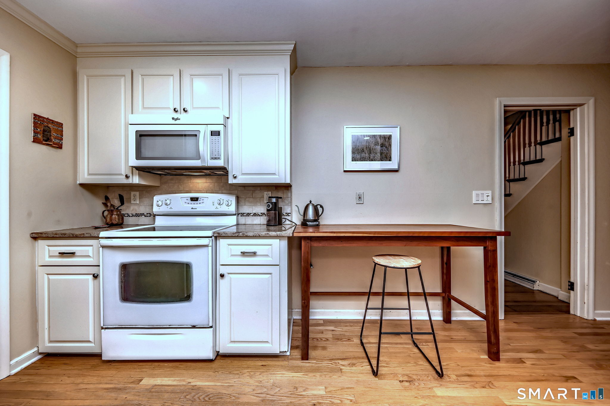 14 Ann Drive Bethany, CT 06524 - Photo 22 of 40 a kitchen with stainless steel appliances a stove a sink cabinets and a refrigerator