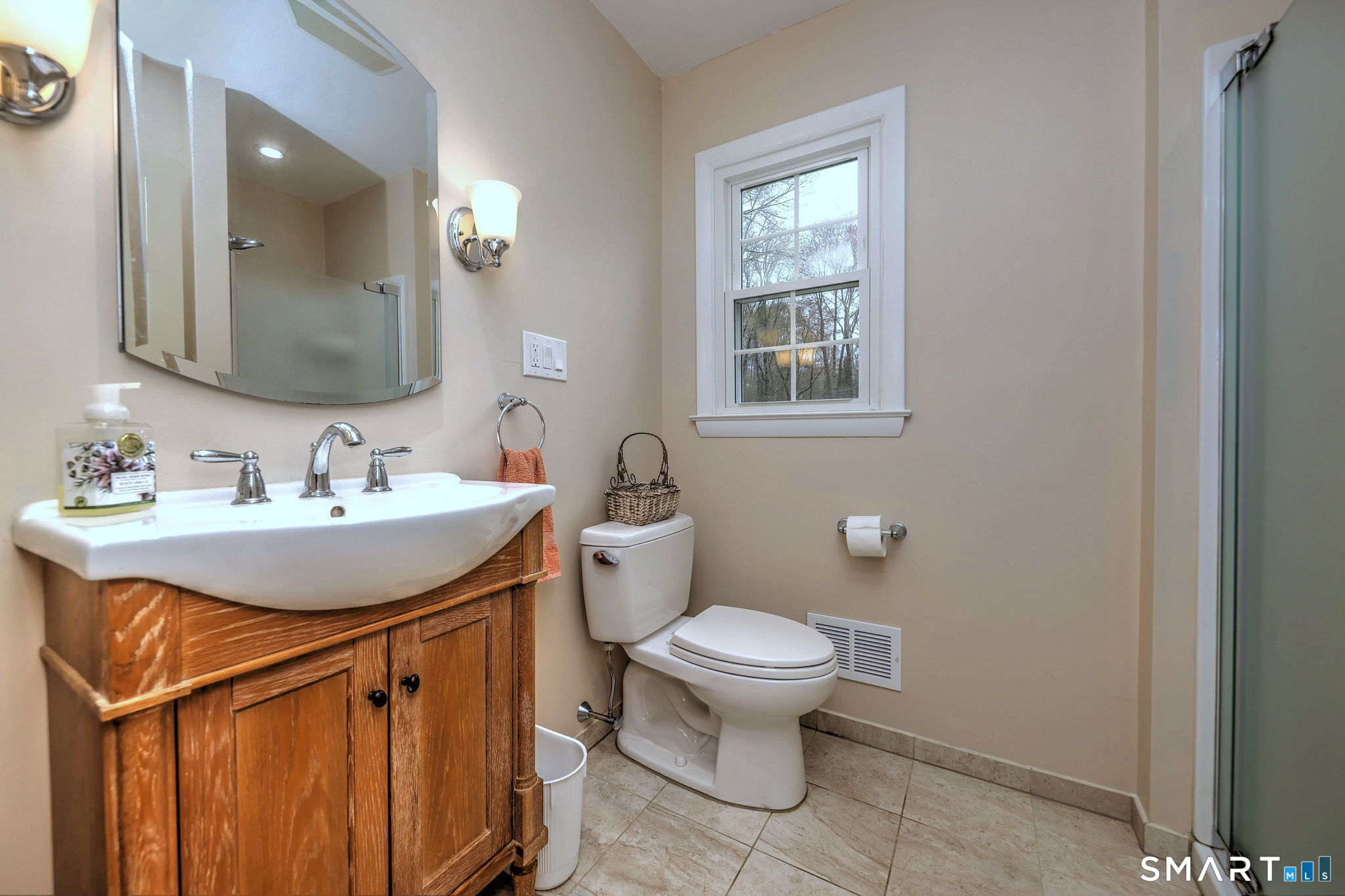 14 Ann Drive Bethany, CT 06524 - Photo 24 of 40 a bathroom with a sink toilet and mirror