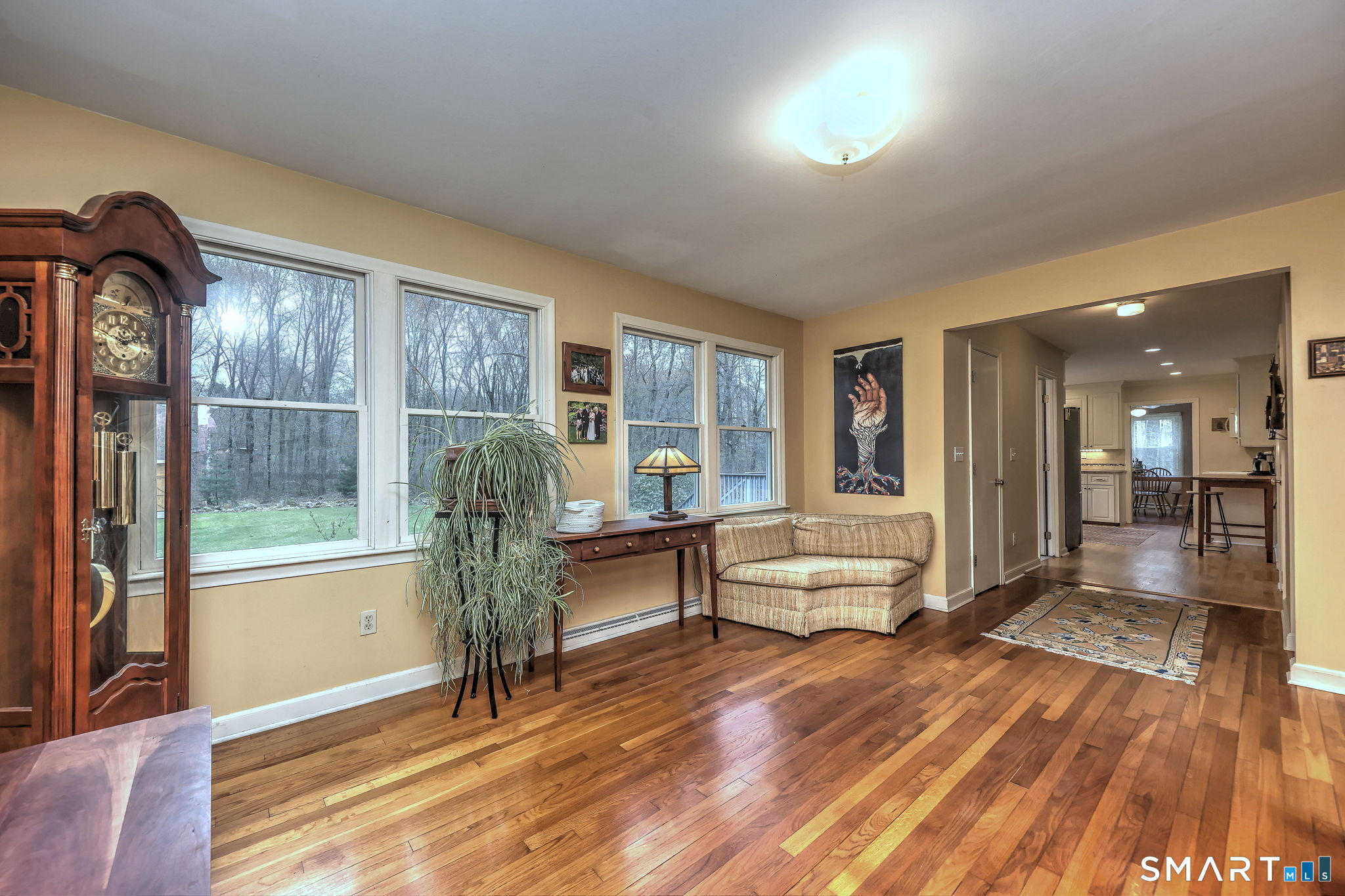14 Ann Drive Bethany, CT 06524 - Photo 26 of 40 a living room with furniture and a wooden floor