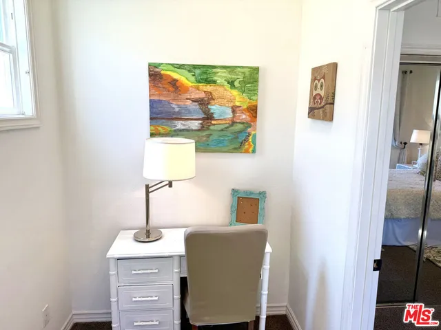 a room with furniture and a window