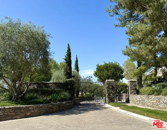 a view of a street with a building in the background